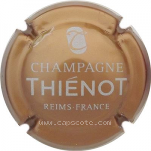 Capsule Or foncé et crème