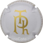 Capsule Petit Th. Blanc et or